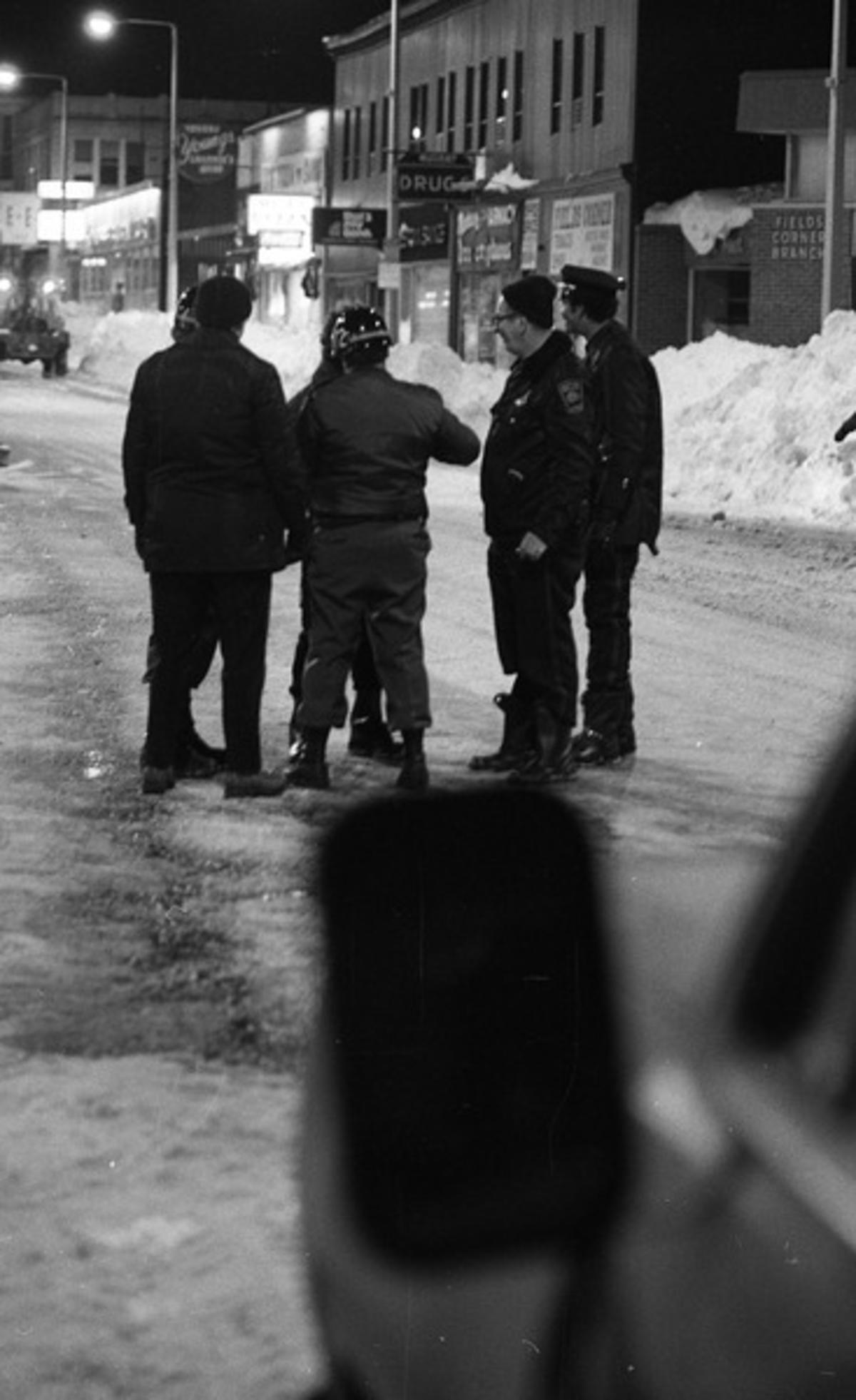 : 972nd Military Police Company policemen and unidentified police officers on Dorchester Avenue