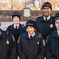 A group of smiling police cadets