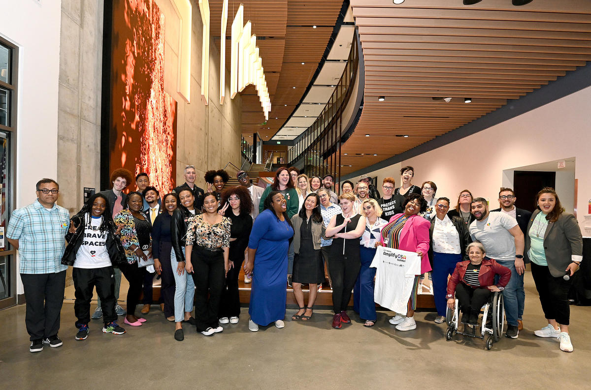 Adult supporters of AmplifyGSA Initiative pose for a photo